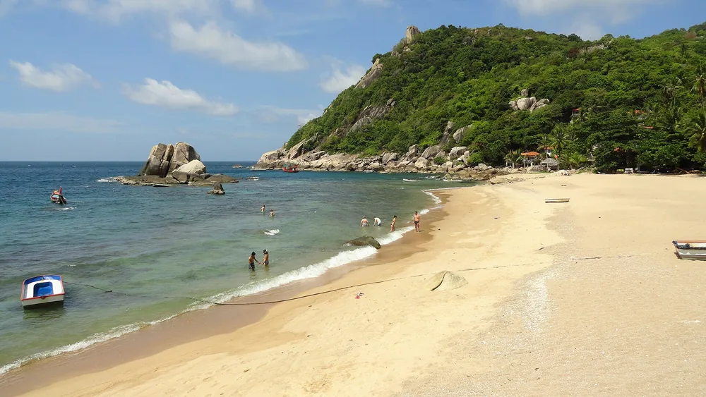 Rocky tropical coastline at Tanote Bay on Ko Tao. Destination context photograph.